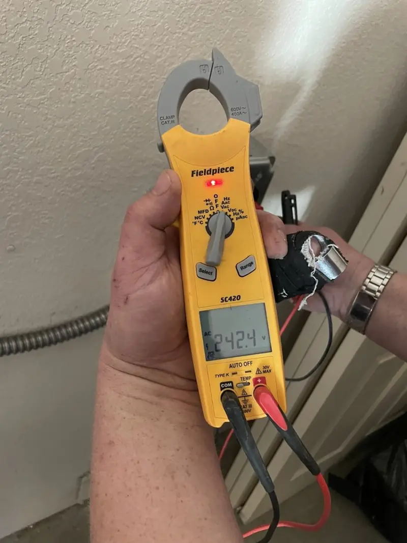 Voltage testing with clamp meter during Hot Tub / Pool Electrical Wiring in Brigantine